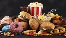 https://www.precisionorthomd.com/wp-content/uploads/2023/10/percision-blog-header-junk-food-102323.jpg